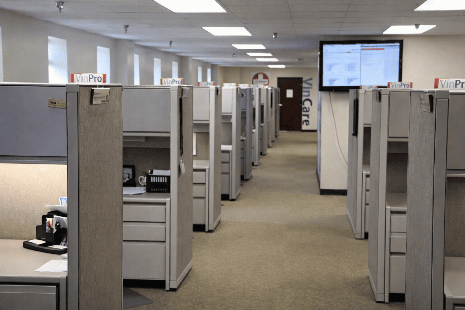 Modern office cubicles featuring professional cubicle signage